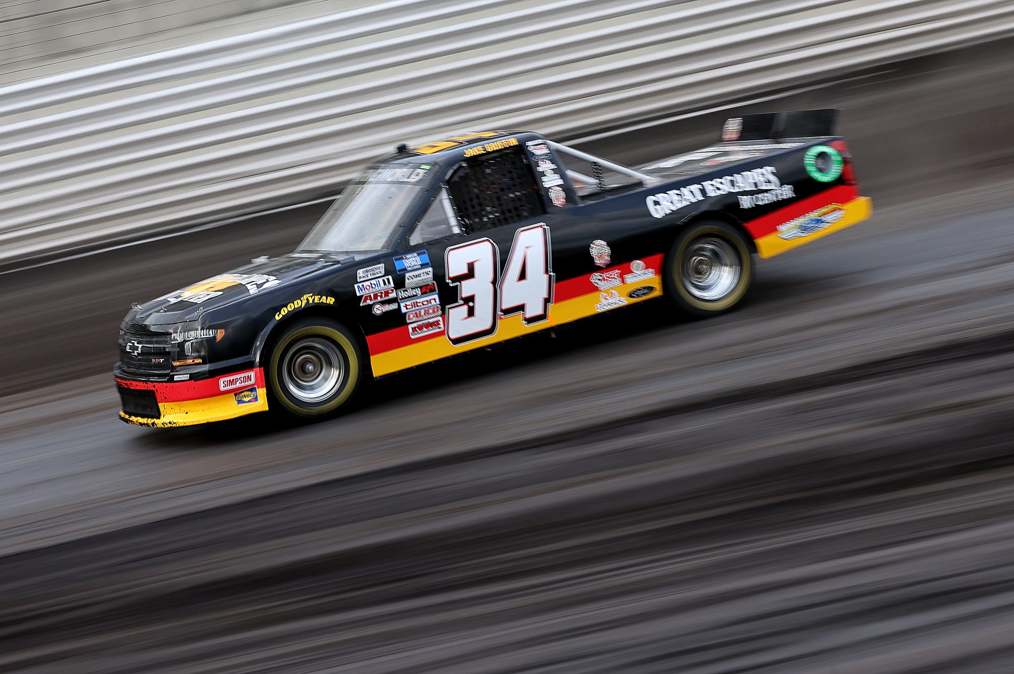 KNOXVILLE, IOWA - JULY 09: Jake Griffin, driver of the #34 Great Escapes RV Center Chevrolet, drives during qualifying for the NASCAR Camping World Truck Series Corn Belt 150 presented by Premier Chevy Dealers at Knoxville Raceway on July 09, 2021 in Knoxville, Iowa. (Photo by James Gilbert/Getty Images) | Getty Images
