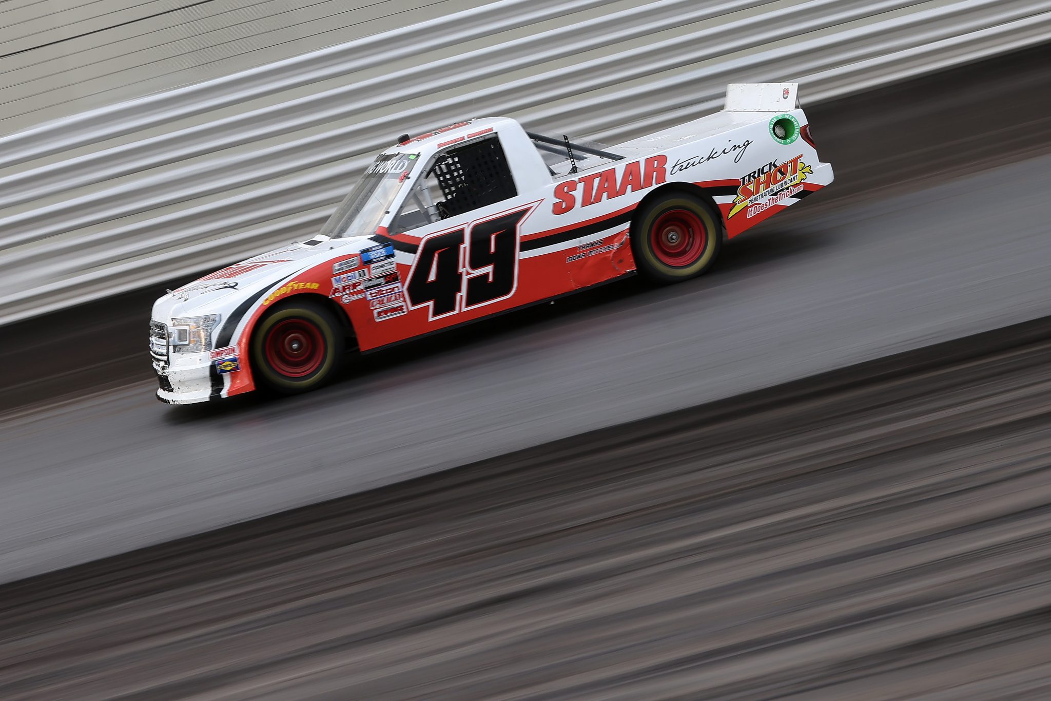 KNOXVILLE, IOWA - JULY 09: Andrew Gordon, driver of the #49 Staar Trucking Toyota, drives during qualifying for the NASCAR Camping World Truck Series Corn Belt 150 presented by Premier Chevy Dealers at Knoxville Raceway on July 09, 2021 in Knoxville, Iowa. (Photo by James Gilbert/Getty Images) | Getty Images