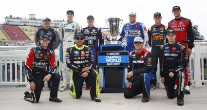 WATKINS GLEN, NEW YORK - AUGUST 07: The playoffs contenders for the NASCAR Camping World Truck Series, front row L-R: Chandler Smith, driver of the #18 Safelite AutoGlass Toyota, Matt Crafton, driver of the #88 Ideal Door/Menards Toyota, Stewart Friesen, driver of the #52 Halmar International Toyota, Ben Rhodes, driver of the #99 Bombardier LearJet 75 Toyota,  and back row L-R: Sheldon Creed, driver of the #2 Liftkits4less.com Chevrolet, Carson Hocevar, driver of the #42 Premier Security Chevrolet, John Hunter Nemechek, driver of the #4 Mobil 1 Toyota,  Austin Hill, driver of the #16 United Rentals Toyota, Zane Smith, driver of the #21 Bay Mountain Air Chevrolet, and Todd Gilliland, driver of the #38 Crosley Brands Ford,  pose for photos after the NASCAR Camping World Truck Series United Rentals 176 at Watkins Glen International on August 07, 2021 in Watkins Glen, New York. (Photo by Jared C. Tilton/Getty Images) | Getty Images