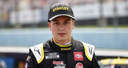 WATKINS GLEN, NEW YORK - AUGUST 08: Christopher Bell, driver of the #20 STANLEY Toyota, walks the grid prior to the NASCAR Cup Series Go Bowling at The Glen at Watkins Glen International on August 08, 2021 in Watkins Glen, New York. (Photo by Jared C. Tilton/Getty Images) | Getty Images