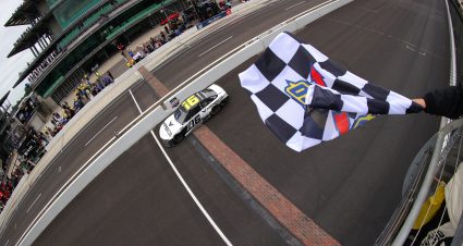 INDIANAPOLIS, INDIANA - AUGUST 15: AJ Allmendinger, driver of the #16 Hyperice Chevrolet, takes the checkered flag to win the NASCAR Cup Series Verizon 200 at the Brickyard at Indianapolis Motor Speedway on August 15, 2021 in Indianapolis, Indiana. (Photo by Stacy Revere/Getty Images) | Getty Images