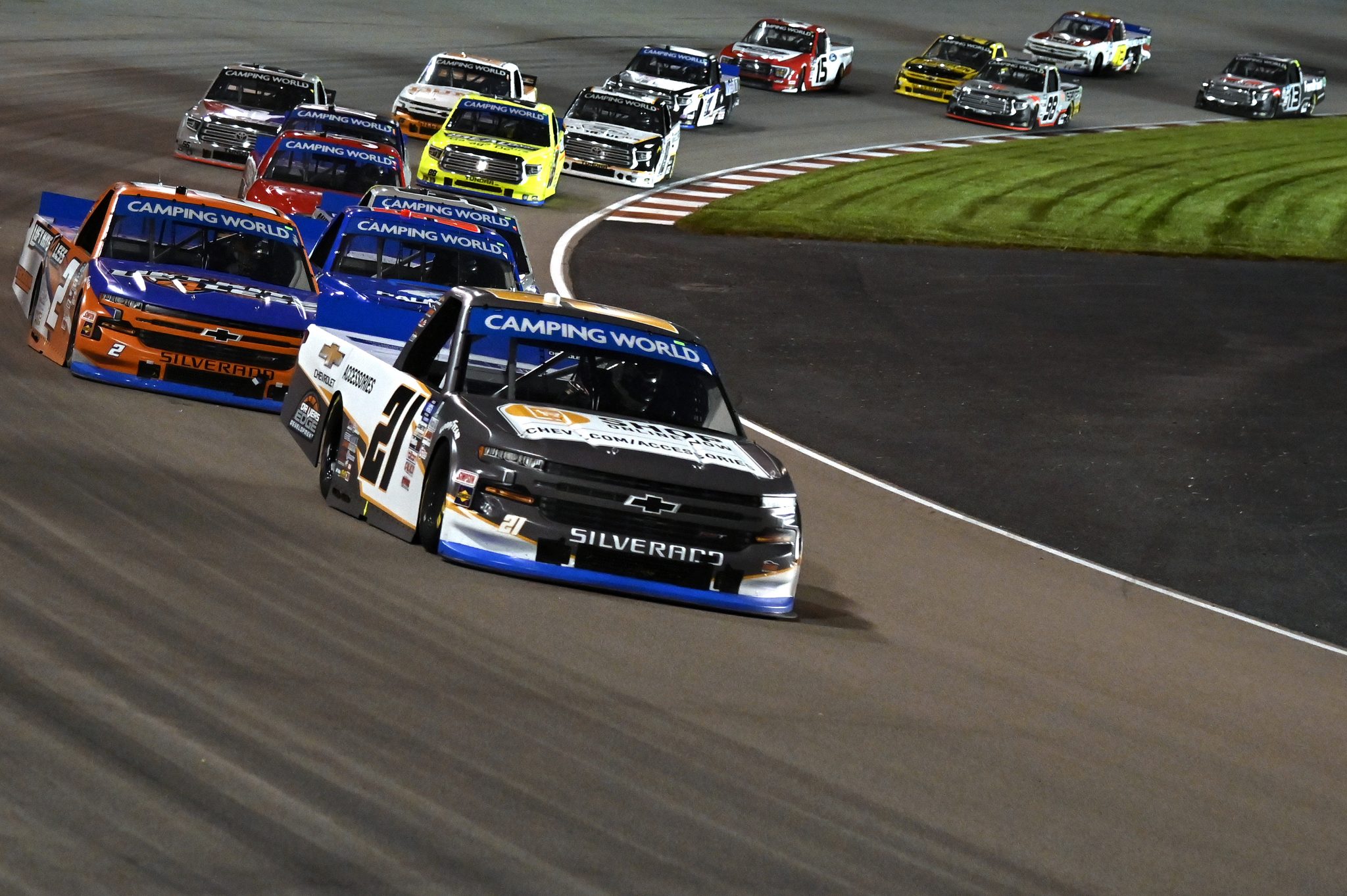 MADISON, ILLINOIS - AUGUST 20: Zane Smith, driver of the #21 Chevy Accessories Chevrolet, and Sheldon Creed, driver of the #2 Liftkits4less.com Chevrolet, race during the NASCAR Camping World Truck Series Toyota 200 presented by CK Power at Gateway Motorsports Park on August 20, 2021 in Madison, Illinois. (Photo by Jeff Curry/Getty Images) | Getty Images
