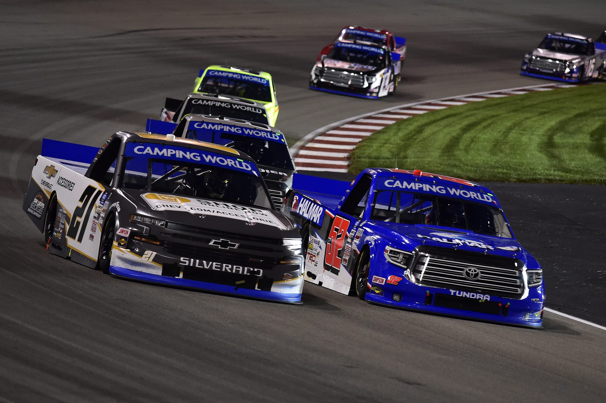 MADISON, ILLINOIS - AUGUST 20: Stewart Friesen, driver of the #52 Halmar International Toyota, and Zane Smith, driver of the #21 Chevy Accessories Chevrolet, race during the NASCAR Camping World Truck Series Toyota 200 presented by CK Power at Gateway Motorsports Park on August 20, 2021 in Madison, Illinois. (Photo by Jeff Curry/Getty Images) | Getty Images