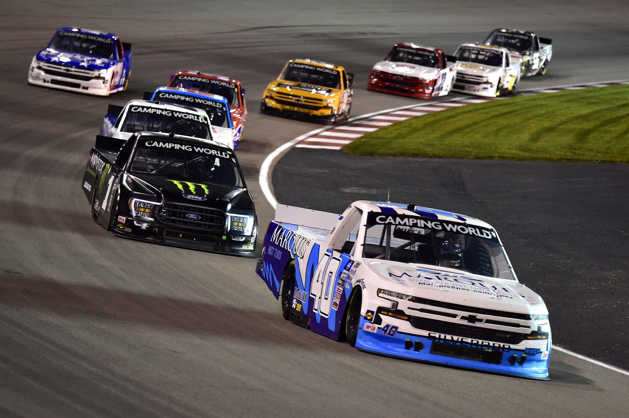 MADISON, ILLINOIS - AUGUST 20: Ryan Truex, driver of the #40 Marquis Spas Chevrolet, and Hailie Deegan, driver of the #1 Monster Ford, race during the NASCAR Camping World Truck Series Toyota 200 presented by CK Power at Gateway Motorsports Park on August 20, 2021 in Madison, Illinois. (Photo by Jeff Curry/Getty Images) | Getty Images