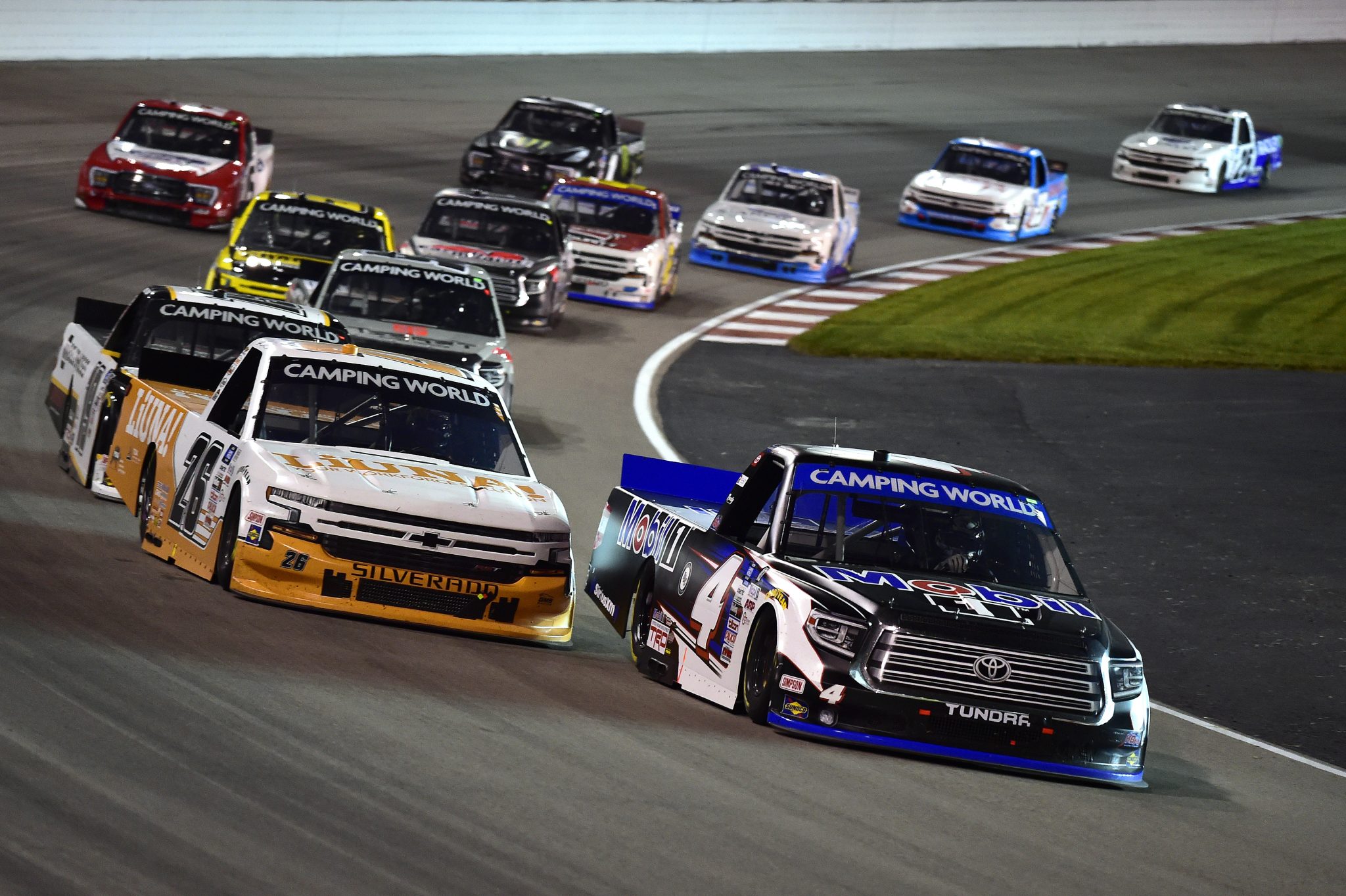 MADISON, ILLINOIS - AUGUST 20: John H. Nemechek, driver of the #4 Mobil 1 Toyota, and Tyler Ankrum, driver of the #26 LiUNA! Chevrolet, race during the NASCAR Camping World Truck Series Toyota 200 presented by CK Power at Gateway Motorsports Park on August 20, 2021 in Madison, Illinois. (Photo by Jeff Curry/Getty Images) | Getty Images