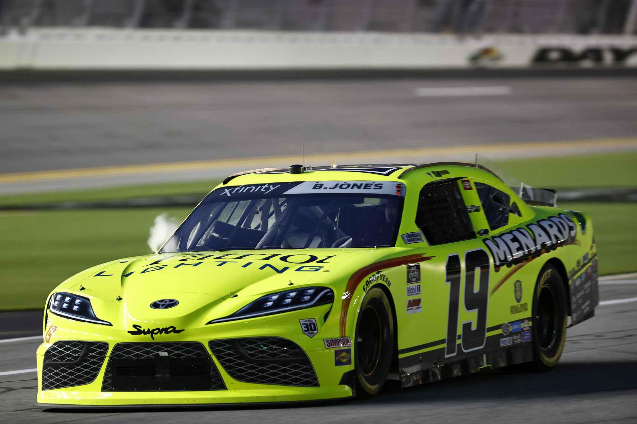 DAYTONA BEACH, FLORIDA - AUGUST 27: Brandon Jones, driver of the #19 Menards/Patriot Lighting Toyota, drives off the track as steam is seen coming from the hood of the car during the NASCAR Xfinity Series Wawa 250 at Daytona International Speedway on August 27, 2021 in Daytona Beach, Florida. (Photo by Jared C. Tilton/Getty Images) | Getty Images