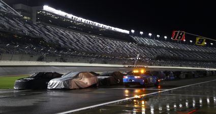 DAYTONA BEACH, FLORIDA - AUGUST 27: A general view of covered cars on the grid under a rain delay during the NASCAR Xfinity Series Wawa 250 at Daytona International Speedway on August 27, 2021 in Daytona Beach, Florida. (Photo by Jared C. Tilton/Getty Images) | Getty Images