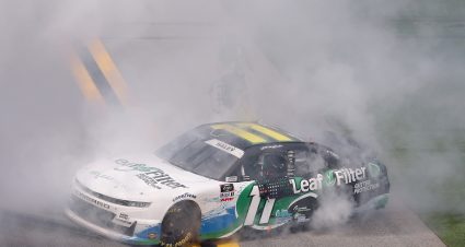 DAYTONA BEACH, FLORIDA - AUGUST 28: Justin Haley, driver of the #11 LeafFilter Gutter Protection Chevrolet, celebrates with a burnout after winning  the NASCAR Xfinity Series Wawa 250 at Daytona International Speedway on August 28, 2021 in Daytona Beach, Florida. (Photo by James Gilbert/Getty Images) | Getty Images