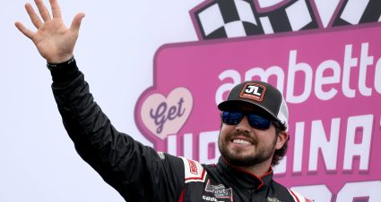 LOUDON, NEW HAMPSHIRE - JULY 17: Jesse Little, driver of the #78 Toyota, waves to fans during pre-race ceremonies prior to the NASCAR Xfinity Series Ambetter Get Vaccinated 200 at New Hampshire Motor Speedway on July 17, 2021 in Loudon, New Hampshire. (Photo by James Gilbert/Getty Images) | Getty Images