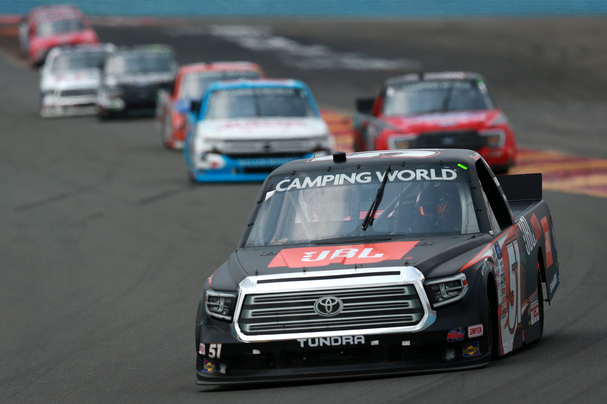 WATKINS GLEN, NEW YORK - AUGUST 07: Corey Heim, driver of the #51 JBL Toyota, drives during the NASCAR Camping World Truck Series United Rentals 176 at Watkins Glen International on August 07, 2021 in Watkins Glen, New York. (Photo by Sean Gardner/Getty Images) | Getty Images
