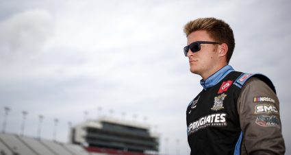 LEBANON, TENNESSEE - JUNE 19: Stefan Parsons, driver of the #99 Springrates/Dogecoin Toyota, walks the grid during qualifying for the NASCAR Xfinity Series Tennessee Lottery 250 at Nashville Superspeedway on June 19, 2021 in Lebanon, Tennessee. (Photo by Jared C. Tilton/Getty Images) | Getty Images