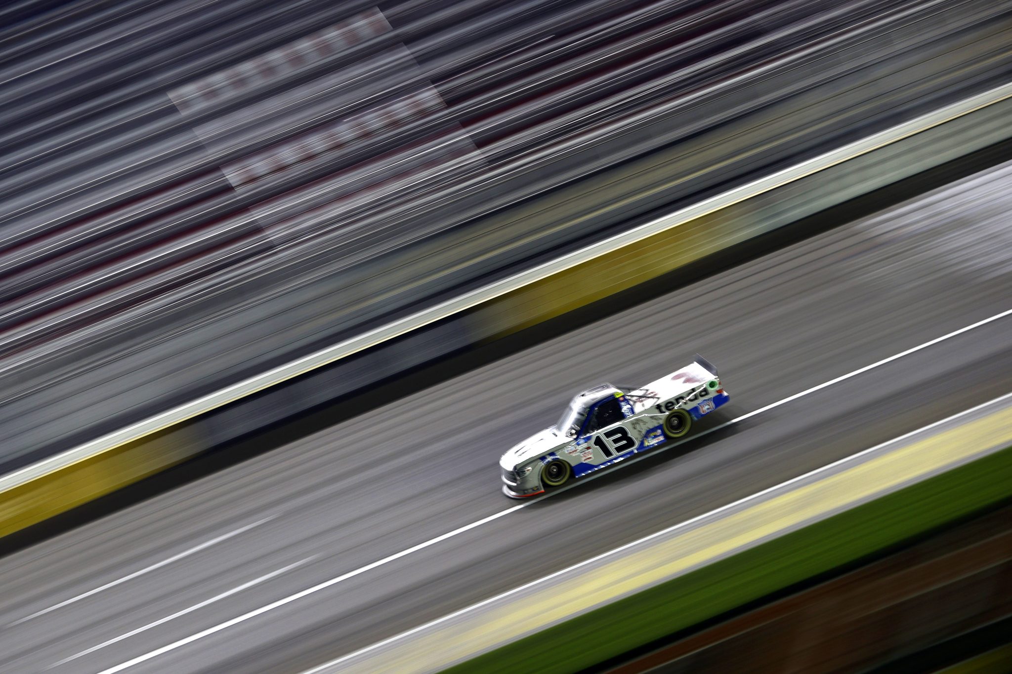 LAS VEGAS, NEVADA - SEPTEMBER 24: Johnny Sauter, driver of the #13 All American Quarter Horse Congress/Tenda, drives during the NASCAR Camping World Truck Series Victoria's Voice Foundation 200 presented by Westgate Resorts at Las Vegas Motor Speedway on September 24, 2021 in Las Vegas, Nevada. (Photo by Steph Chambers/Getty Images) | Getty Images