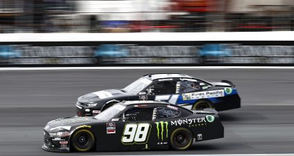 LOUDON, NEW HAMPSHIRE - JULY 17: Riley Herbst, driver of the #98 Monster Energy Ford, and Jeremy Clements, driver of the #51 First Pacific Funding Chevrolet, race during the NASCAR Xfinity Series Ambetter Get Vaccinated 200 at New Hampshire Motor Speedway on July 17, 2021 in Loudon, New Hampshire. (Photo by Jared C. Tilton/Getty Images) | Getty Images