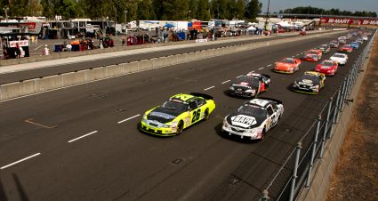 PORTLAND, OR - AUGUST 26: Greg Pursley, driver of the #26 GPM/Star Nursery/Real Water Ford leads a pack of cars at the start of the NASCAR K&N Pro Series West Napa Auto Parts Salute to the Troops 125 on August 26, 2012 at Portland International Raceway in Portland, Oregon.  (Photo by Craig Mitchelldyer/Getty Images for NASCAR) | Getty Images