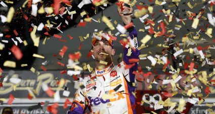 LAS VEGAS, NEVADA - SEPTEMBER 26: Denny Hamlin, driver of the #11 FedEx Office Toyota, celebrates in victory lane after winning the NASCAR Cup Series South Point 400 at Las Vegas Motor Speedway on September 26, 2021 in Las Vegas, Nevada. (Photo by Steph Chambers/Getty Images) | Getty Images