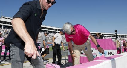 September 28 , 2021: Kurt Busch, Daniel Hemric and Beast Cancer survivors paint the walls pink at the Charlotte Motor Speedway in Charlotte  , NC.  ,  .  .   .  (HHP/Andrew Coppley)