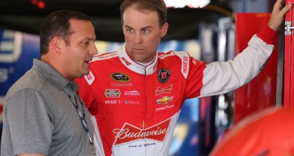 TALLADEGA, AL - OCTOBER 23:  Greg Zipadelli, competition director at Stewart-Haas Racing, and Kevin Harvick, driver of the #4 Budweiser/Jimmy John's Chevrolet, talk in the garage area during practice for the NASCAR Sprint Cup Series CampingWorld.com 500 at Talladega Superspeedway on October 23, 2015 in Talladega, Alabama.  (Photo by Jerry Markland/Getty Images) | Getty Images