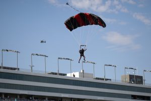 LAS VEGAS, NEVADA - SEPTEMBER 25: Matt Jaskol, driver of the #66 Autoparts4less.com Toyota, parachutes onto the infield prior to the start the NASCAR Xfinity Series Alsco Uniforms 302 at Las Vegas Motor Speedway on September 25, 2021 in Las Vegas, Nevada. (Photo by Chris Graythen/Getty Images) | Getty Images