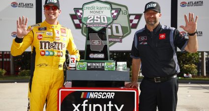 HAMPTON, GEORGIA - JULY 10: Kyle Busch, driver of the #54 Extra Gum Toyota, and crew chief Chris Gayle celebrate in victory lane after winning the NASCAR Xfinity Series Credit Karma Money 250 at Atlanta Motor Speedway on July 10, 2021 in Hampton, Georgia. (Photo by Jared C. Tilton/Getty Images) | Getty Images