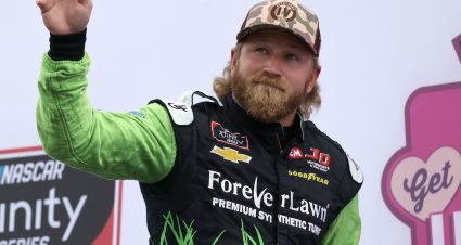 LOUDON, NEW HAMPSHIRE - JULY 17: Jeffrey Earnhardt, driver of the #0 In Memory of Latane Key Chevrolet, waves to fans on stage during pre-race ceremonies prior to the NASCAR Xfinity Series Ambetter Get Vaccinated 200 at New Hampshire Motor Speedway on July 17, 2021 in Loudon, New Hampshire. (Photo by James Gilbert/Getty Images) | Getty Images