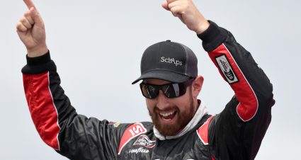 LOUDON, NEW HAMPSHIRE - JULY 17: CJ McLaughlin, driver of the #61 Sci Aps Toyota, walks on stage during pre-race ceremonies prior to the NASCAR Xfinity Series Ambetter Get Vaccinated 200 at New Hampshire Motor Speedway on July 17, 2021 in Loudon, New Hampshire. (Photo by James Gilbert/Getty Images) | Getty Images