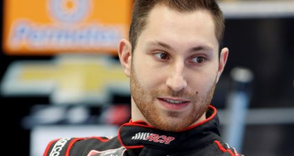 CONCORD, NORTH CAROLINA - OCTOBER 11: Kaz Grala driver and a crew member talk in the garage area during the NASCAR Cup Series test at the Charlotte Motor Speedway on October 11, 2021 in Concord, North Carolina. (Photo by Bob Leverone/Getty Images) | Getty Images