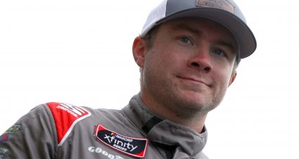 KANSAS CITY, KANSAS - OCTOBER 23: Matt Mills, driver of the #99 J.F. Electric Chevrolet, waits on the grid prior to the NASCAR Xfinity Series Kansas Lottery 300 at Kansas Speedway on October 23, 2021 in Kansas City, Kansas. (Photo by Sean Gardner/Getty Images) | Getty Images