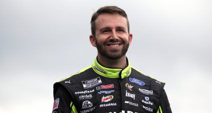 KANSAS CITY, KANSAS - OCTOBER 24: Matt DiBenedetto, driver of the #21 Menards/Monster Ford, walks onstage during pre-race ceremonies prior to the NASCAR Cup Series Hollywood Casino 400 at Kansas Speedway on October 24, 2021 in Kansas City, Kansas. (Photo by Sean Gardner/Getty Images) | Getty Images