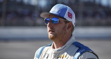 TALLADEGA, ALABAMA - OCTOBER 01: Austin Hill, driver of the #21 Bennett Transportation Chevrolet, walks the grid prior to  the NASCAR Xfinity Series Sparks 300 at Talladega Superspeedway on October 01, 2022 in Talladega, Alabama. (Photo by Sean Gardner/Getty Images) | Getty Images