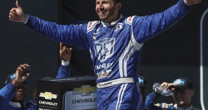 TALLADEGA, ALABAMA - OCTOBER 01: Matt DiBenedetto, driver of the #25 Rackley Roofing Chevrolet, celebrates in victory lane after winning the NASCAR Camping World Truck Series Chevy Silverado 250 at Talladega Superspeedway on October 01, 2022 in Talladega, Alabama. (Photo by Sean Gardner/Getty Images) | Getty Images