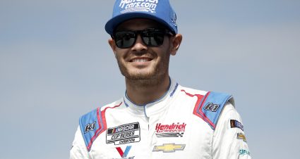 CONCORD, NORTH CAROLINA - OCTOBER 09: Kyle Larson, driver of the #5 HendrickCars.com Chevrolet, walks onstage during driver intros prior to the NASCAR Cup Series Bank of America Roval 400 at Charlotte Motor Speedway on October 09, 2022 in Concord, North Carolina. (Photo by Jared C. Tilton/Getty Images) | Getty Images