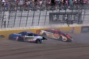 LAS VEGAS, NEVADA - OCTOBER 16: Kyle Larson, driver of the #5 HendrickCars.com Chevrolet, and Bubba Wallace, driver of the #45 McDonald's Toyota, spin after an on-track incident during the NASCAR Cup Series South Point 400 at Las Vegas Motor Speedway on October 16, 2022 in Las Vegas, Nevada. (Photo by Jonathan Bachman/Getty Images) | Getty Images