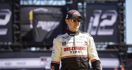 TALLADEGA, ALABAMA - OCTOBER 02: Austin Cindric, driver of the #2 Discount Tire Ford, walks onstage during driver intros prior to the NASCAR Cup Series YellaWood 500 at Talladega Superspeedway on October 02, 2022 in Talladega, Alabama. (Photo by Chris Graythen/Getty Images) | Getty Images