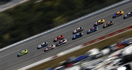 TALLADEGA, ALABAMA - OCTOBER 02: Ryan Blaney, driver of the #12 MenardsDutch Boy Ford, leads the field during the NASCAR Cup Series YellaWood 500 at Talladega Superspeedway on October 02, 2022 in Talladega, Alabama. (Photo by Sean Gardner/Getty Images) | Getty Images
