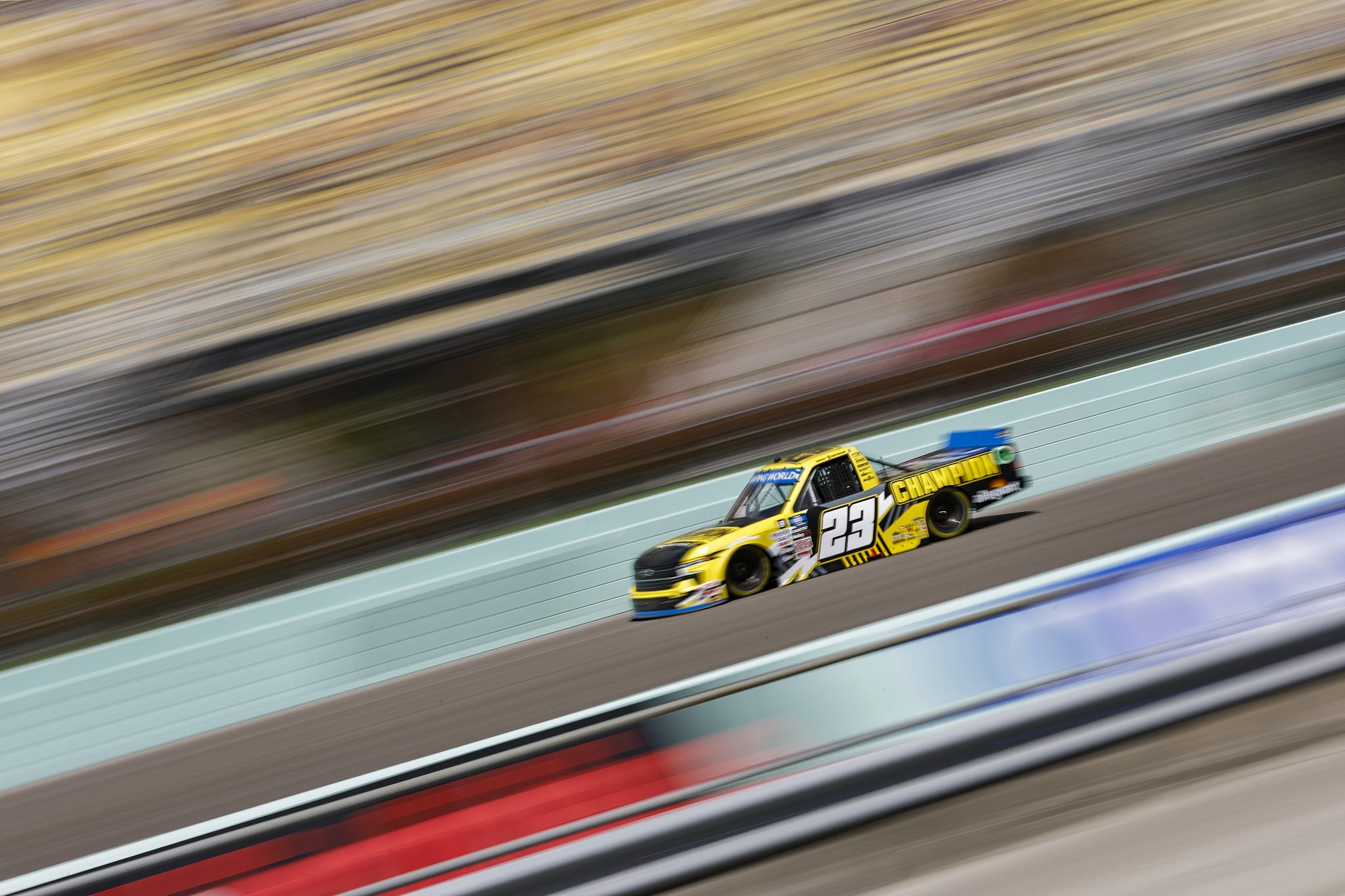 HOMESTEAD, FLORIDA - OCTOBER 22: Grant Enfinger, driver of the #23 Champion Power Equipment Chevrolet, drives during the NASCAR Camping World Truck Series Baptist Health 200 at Homestead-Miami Speedway on October 22, 2022 in Homestead, Florida. (Photo by Sean Gardner/Getty Images) | Getty Images