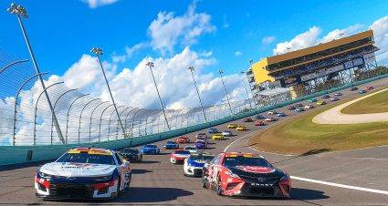 HOMESTEAD, FLORIDA - OCTOBER 23: William Byron, driver of the #24 Liberty University Chevrolet, and Christopher Bell, driver of the #20 Rheem - WATTS Toyota, lead the field on a pace lap prior to the NASCAR Cup Series Dixie Vodka 400 at Homestead-Miami Speedway on October 23, 2022 in Homestead, Florida. (Photo by Sean Gardner/Getty Images) | Getty Images