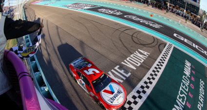 HOMESTEAD, FLORIDA - OCTOBER 23: Kyle Larson, driver of the #5 Valvoline Chevrolet, takes the checkered flag to win the NASCAR Cup Series Dixie Vodka 400 at Homestead-Miami Speedway on October 23, 2022 in Homestead, Florida. (Photo by Jared East/Getty Images) | Getty Images