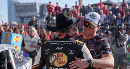 FORT WORTH, TEXAS - SEPTEMBER 24: Crew chief Lucas Lambert congratulates Noah Gragson, driver of the #9 Bass Pro Shops/TrueTimber/BRCC Chevrolet, in victory lane after winning the NASCAR Xfinity Series Andy's Frozen Custard 300 at Texas Motor Speedway on September 24, 2022 in Fort Worth, Texas. (Photo by James Gilbert/Getty Images) | Getty Images