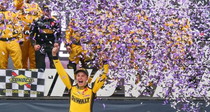 MARTINSVILLE, VIRGINIA - OCTOBER 30: Christopher Bell, driver of the #20 DeWalt Toyota, celebrates in victory lane after winning the NASCAR Cup Series Xfinity 500 at Martinsville Speedway on October 30, 2022 in Martinsville, Virginia. (Photo by Mike Mulholland/Getty Images) | Getty Images
