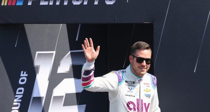 FORT WORTH, TEXAS - SEPTEMBER 25: Alex Bowman, driver of the #48 Ally Chevrolet, waves to fans walks onstage during driver intros prior to the NASCAR Cup Series Auto Trader EchoPark Automotive 500 at Texas Motor Speedway on September 25, 2022 in Fort Worth, Texas. (Photo by James Gilbert/Getty Images) | Getty Images