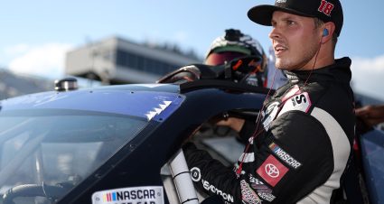 LOUDON, NEW HAMPSHIRE - JULY 15: Trevor Bayne, driver of the #18 Devotion Nutrition Toyota, enters his car during qualifying for the NASCAR Xfinity Series Crayon 200 at New Hampshire Motor Speedway on July 15, 2022 in Loudon, New Hampshire. (Photo by James Gilbert/Getty Images) | Getty Images