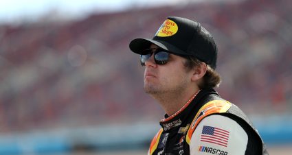 AVONDALE, ARIZONA - NOVEMBER 05: Noah Gragson, driver of the #9 Bass Pro Shops/TrueTimber/BRCC Chevrolet, waits on the grid during qualifying for the NASCAR Xfinity Series Championship  at Phoenix Raceway on November 05, 2022 in Avondale, Arizona. (Photo by Meg Oliphant/Getty Images) | Getty Images