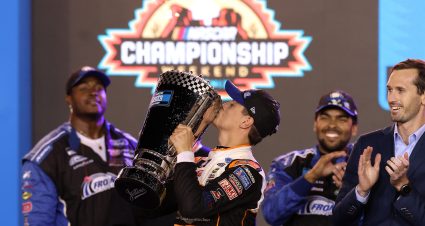AVONDALE, ARIZONA - NOVEMBER 04: Zane Smith, driver of the #38 Michael Roberts Construction Ford, kisses the NASCAR Camping World Truck Series trophy in victory lane after winning the 2022 NASCAR Camping World Truck Series Championship and the NASCAR Camping World Truck Series Lucas Oil 150 at Phoenix Raceway on November 04, 2022 in Avondale, Arizona. (Photo by Christian Petersen/Getty Images) | Getty Images