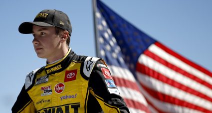 AVONDALE, ARIZONA - NOVEMBER 06: Christopher Bell, driver of the #20 DeWalt Toyota, makes his parade lap during pre-race ceremonies prior to the NASCAR Cup Series Championship at Phoenix Raceway on November 06, 2022 in Avondale, Arizona. (Photo by Chris Graythen/Getty Images) | Getty Images