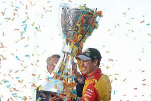 AVONDALE, ARIZONA - NOVEMBER 06: Joey Logano, driver of the #22 Shell Pennzoil Ford, receives the Bill France NASCAR Cup Series Championship trophy from NASCAR President Steve Phelps presents in victory lane after winning the 2022 NASCAR Cup Series Championship at Phoenix Raceway on November 06, 2022 in Avondale, Arizona. (Photo by Christian Petersen/Getty Images) | Getty Images