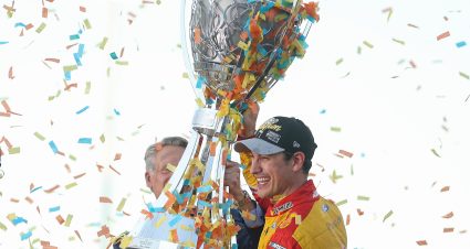 AVONDALE, ARIZONA - NOVEMBER 06: Joey Logano, driver of the #22 Shell Pennzoil Ford, receives the Bill France NASCAR Cup Series Championship trophy from NASCAR President Steve Phelps presents in victory lane after winning the 2022 NASCAR Cup Series Championship at Phoenix Raceway on November 06, 2022 in Avondale, Arizona. (Photo by Christian Petersen/Getty Images) | Getty Images