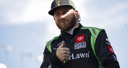 LAS VEGAS, NEVADA - OCTOBER 15: Jeffrey Earnhardt, driver of the #35 ForeverLawn Toyota, gives a thumbs up to fans as he walks onstage during driver intros prior to the NASCAR Xfinity Series Alsco Uniforms 302 at Las Vegas Motor Speedway on October 15, 2022 in Las Vegas, Nevada. (Photo by Sean Gardner/Getty Images) | Getty Images