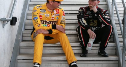INDIANAPOLIS, INDIANA - AUGUST 15: Kyle Busch, driver of the #18 M&M's Mix Toyota, and Tyler Reddick, driver of the #8 BetMGM Chevrolet, talk prior to the NASCAR Cup Series Verizon 200 at the Brickyard at Indianapolis Motor Speedway on August 15, 2021 in Indianapolis, Indiana. (Photo by Sean Gardner/Getty Images) | Getty Images