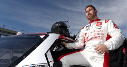 AVONDALE, ARIZONA - NOVEMBER 05: Kaz Grala, driver of the #26 Ruedebusch Toyota, enters his car during qualifying for the NASCAR Xfinity Series Championship  at Phoenix Raceway on November 05, 2022 in Avondale, Arizona. (Photo by Christian Petersen/Getty Images) | Getty Images