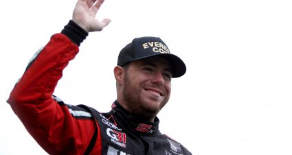 KANSAS CITY, KANSAS - OCTOBER 23: Alex Labbe, driver of the #36 Everest Coin/Prolon Controls Chevrolet, waves to fans during pre-race ceremonies prior to the NASCAR Xfinity Series Kansas Lottery 300 at Kansas Speedway on October 16, 2021 in Kansas City, Kansas. (Photo by Sean Gardner/Getty Images) | Getty Images